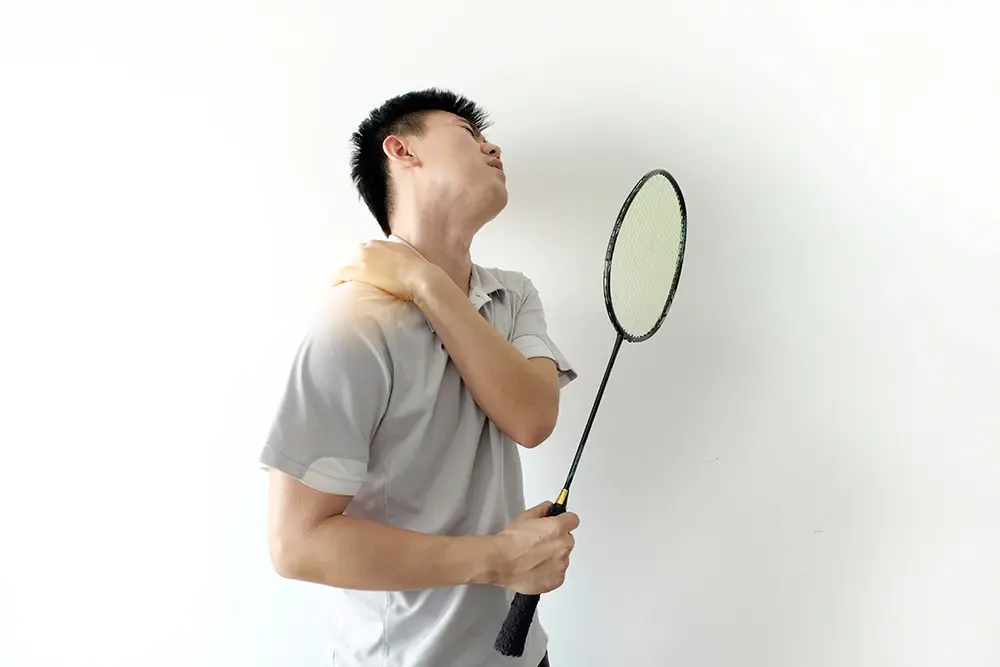 Man with shoulder pain from playing overhead sports.