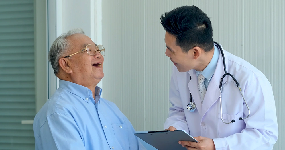 Orthopaedic specialist with a happy patient.