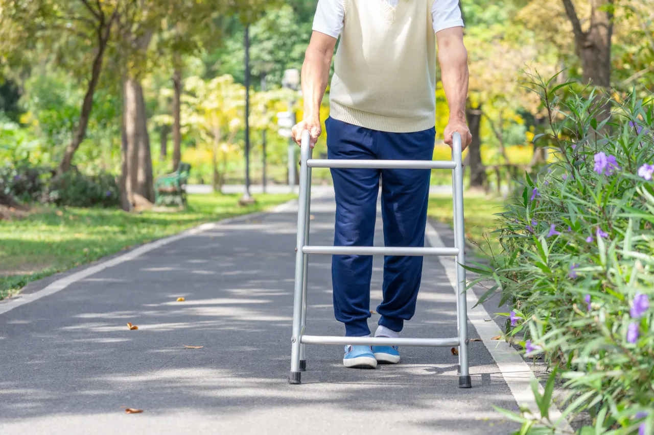 Man walking with a walker