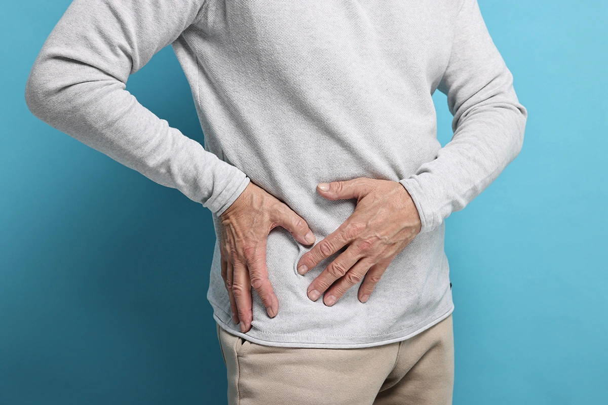 Man experiencing hip pain